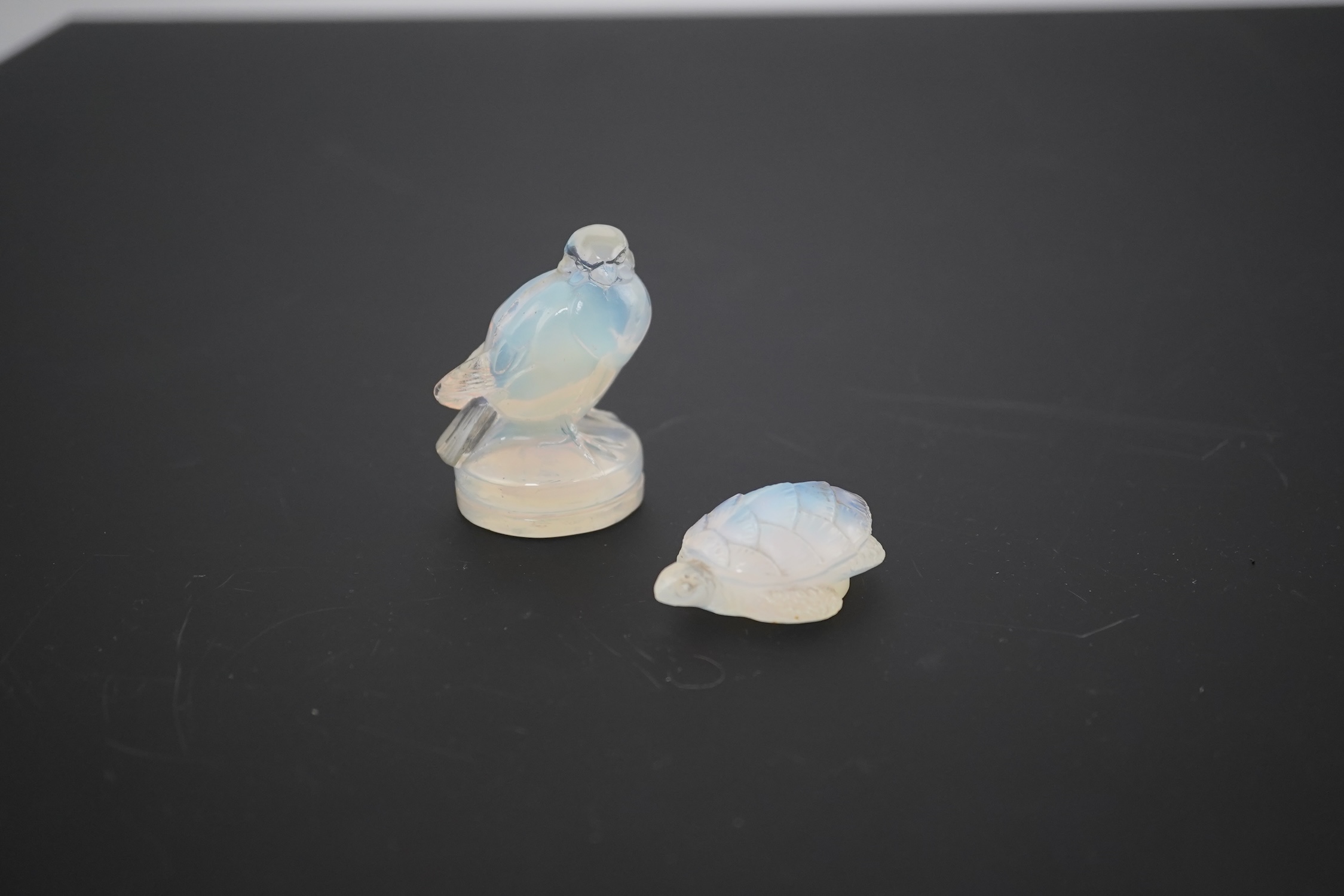 An R. Lalique opalescent glass bird paperweight and a Sabino turtle, Lalique bird high 7cm. Condition - Lalique tail slightly chipped